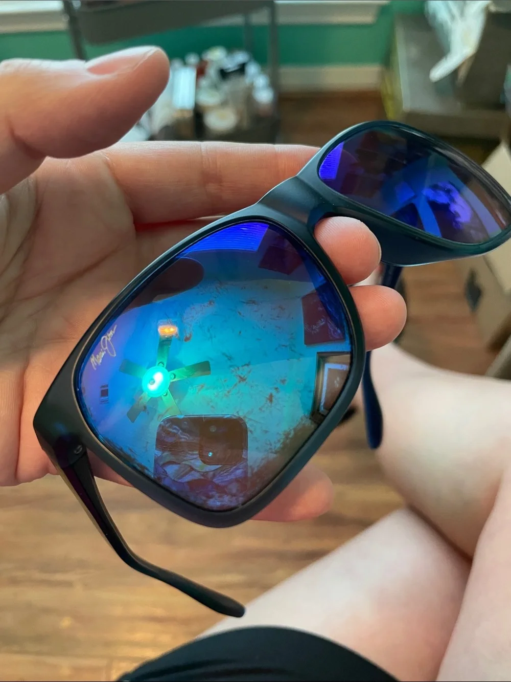 Maui Jim Black Frame Sunglasses with Blue Purple Mirrored Lenses